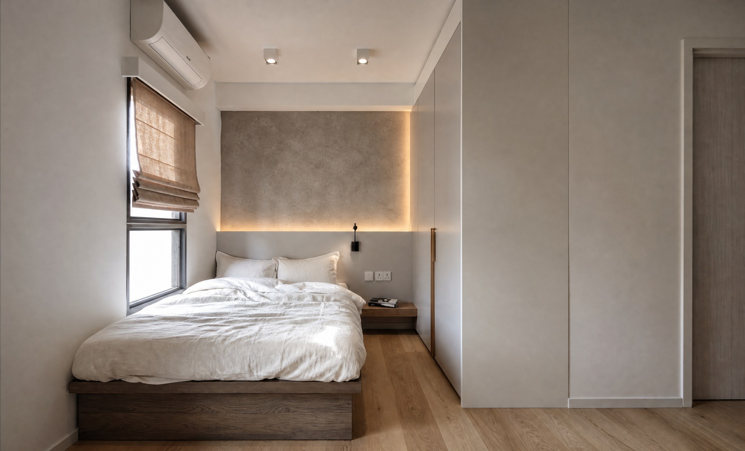 Serenity Park bedroom with an indirectly lit headboard and bespoke white wardrobes