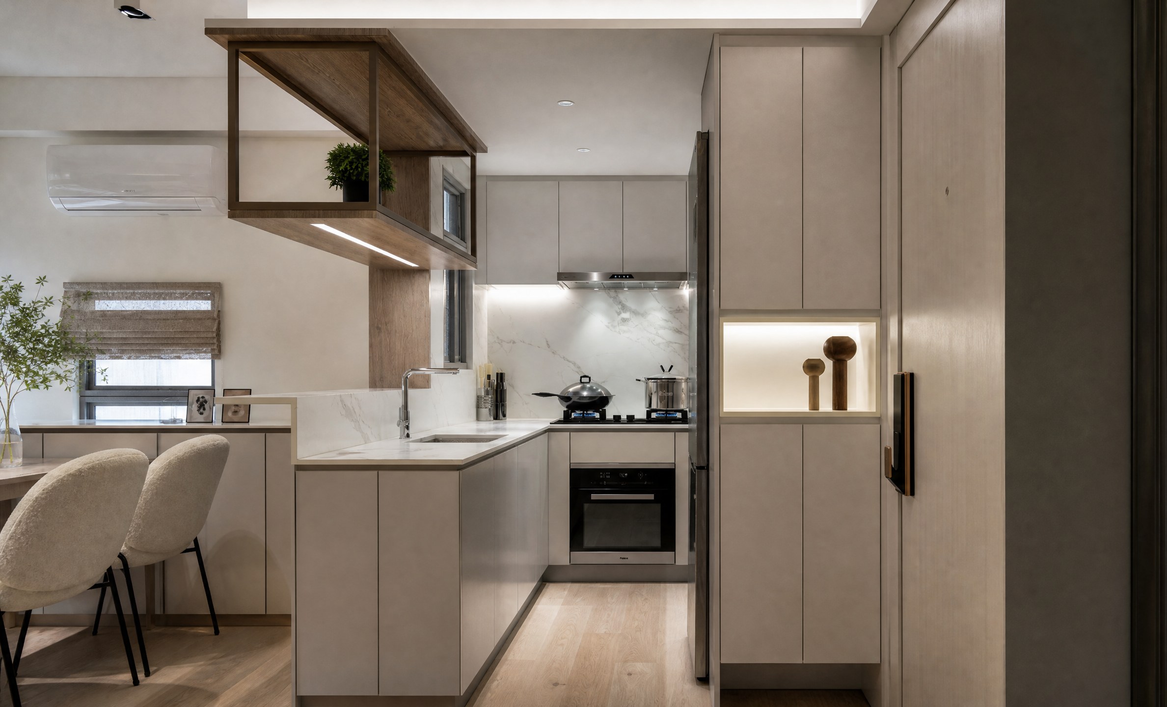 Serenity Park open kitchen with suspended timber shelving, pale cabinets and a built-in oven