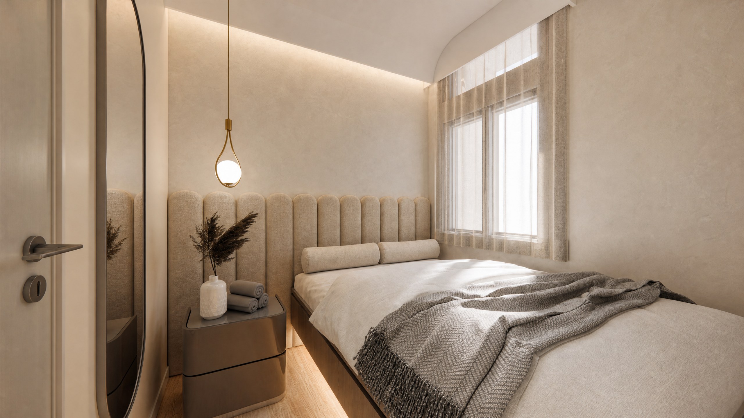 Yan Shing Court bedroom with a curved headboard wall, linear lighting and pale curtains